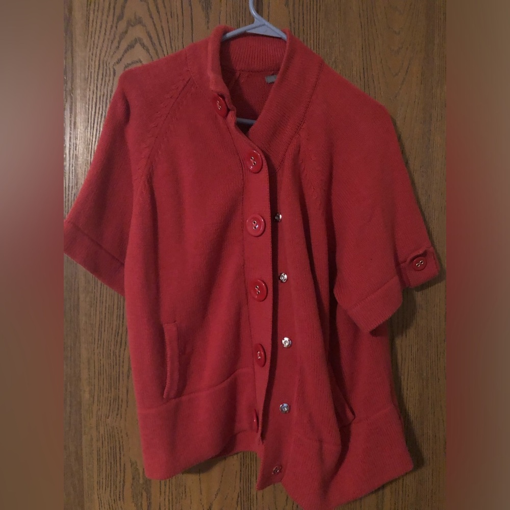 3/4 sleeve, rust colored, button down sweater.